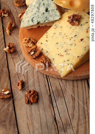 Various types of cheese on slate plate.Copy space. Various types of cheese on slate plate.Copy space. 48297809