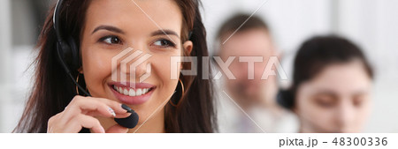 Three call centre service operators at work 48300336