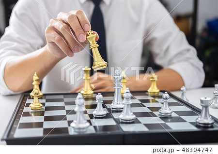 Planning and Strategic concept, Businessman playing chess and th 48304747