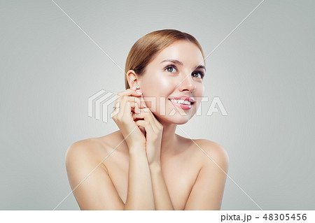 Perfect young woman with diamond earrings Perfect young woman with diamond earrings 48305456