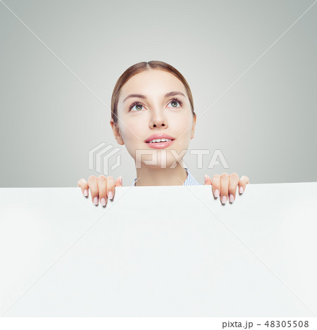 Happy woman looking up  48305508