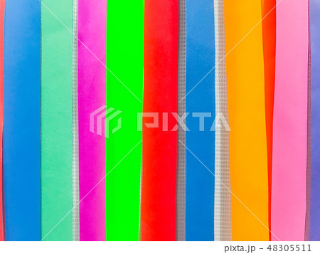 Colored paper strips decorate on board 48305511