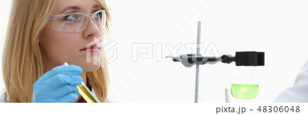 Technician hold in arms in protective gloves 48306048