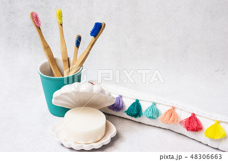 A family set of wooden bamboo toothbrushes on white background 48306663