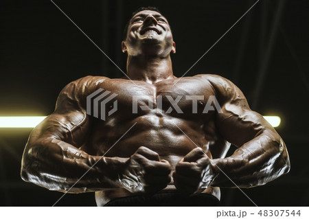 Handsome strong athletic men muscles workout Handsome strong athletic men muscles workout 48307544
