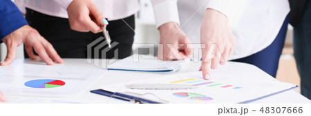Female hand point silver pen to graph on seminar 48307666