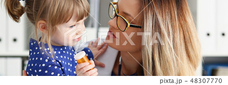A small child is afraid in the hospital room A small child is afraid in the hospital room 48307770