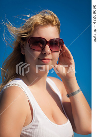 Portrait of young blonde woman at summer 48309090