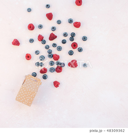 Shopping composition berries and boxes 48309362