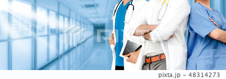 Doctor working in hospital with other doctors. Doctor working in hospital with other doctors. 48314273