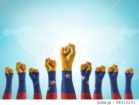 Venezuela flag on people fist hands clipping path Venezuela flag on people fist hands clipping path 48315251