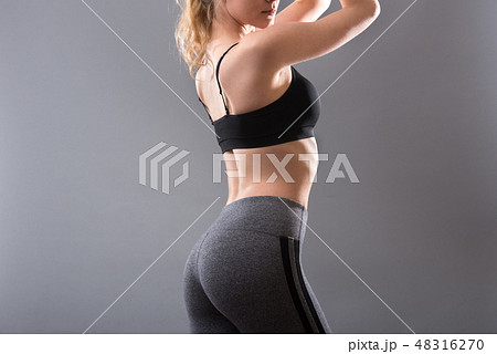 Female sportswear clothes on perfect 