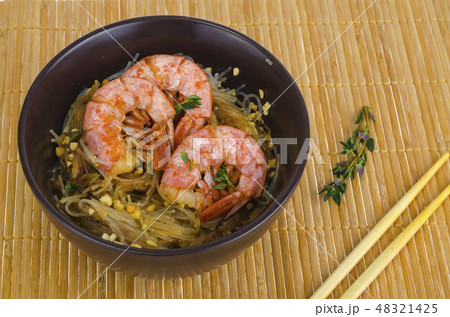 Glass noodles with sauce and shrimps, asian cuisine.  48321425