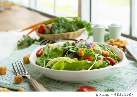 Fresh healthy vegetable caesar salad on plate Fresh healthy vegetable caesar salad on plate 48321937