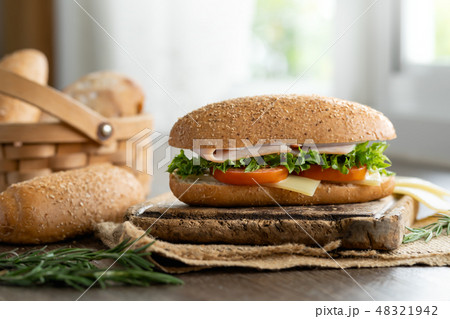 Sandwich ham cheese, tomatoes, lettuce with bread Sandwich ham cheese, tomatoes, lettuce with bread 48321942