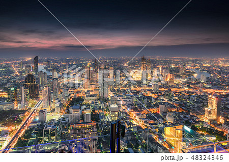 Cityscape of crowded building with light traffic 48324346