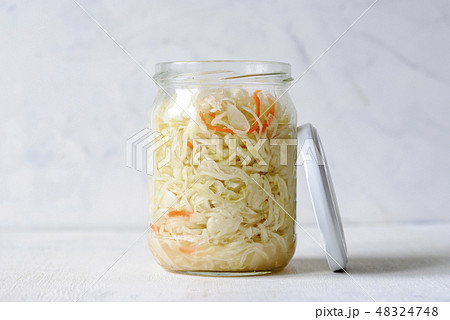 Glass jar of fermented prepared cabbage 48324748