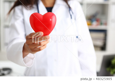 Female doctor hold in arms and cover red 48325905