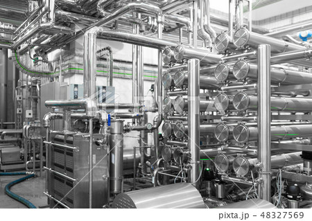 Steel water pipeline, chrome pipes, pipe lines in plant workshop. Industrial background 48327569