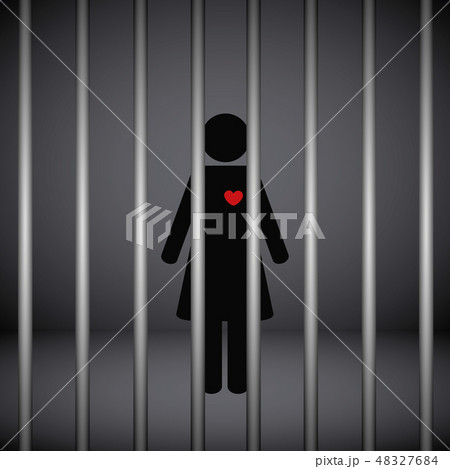 woman with red heart in jail on dark background 48327684