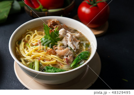 Soup noodles in bowl 48329495