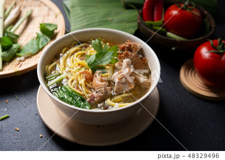 Soup noodles in bowl 48329496