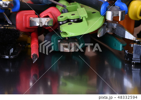 Set of manual tools on metal background close-up Set of manual tools on metal background close-up 48332594