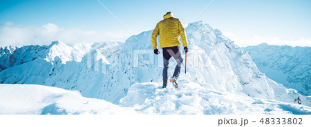A climber in winter A climber in winter 48333802