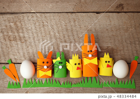 Cute creative photo with easter eggs, paper craft Cute creative photo with easter eggs, paper craft 48334484
