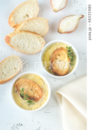 Two bowls of onion soup 48335980
