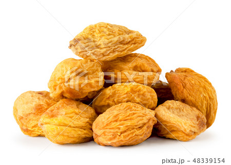 Heap of dried apricots with a bone close-up on a 48339154