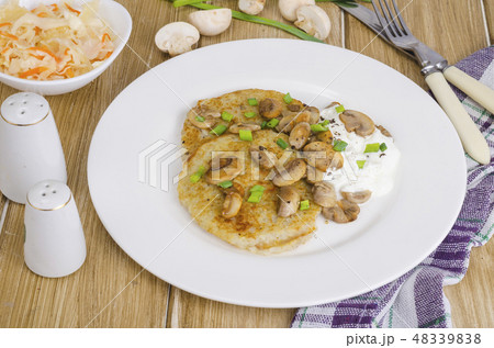Rustic food concept. Fried potato pancakes Rustic food concept. Fried potato pancakes 48339838