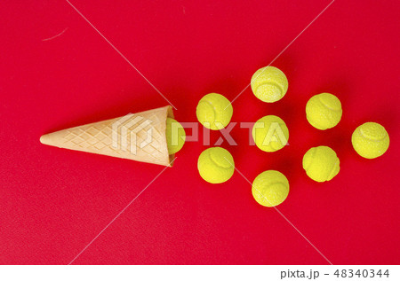 Waffle cone with yellow rubber bands on bright  48340344