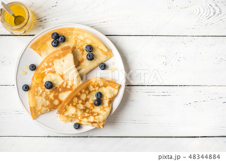 Crepes with blueberries and honey 48344884