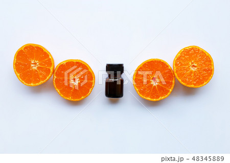 Essential oil of orange on a white background. Essential oil of orange on a white background. 48345889