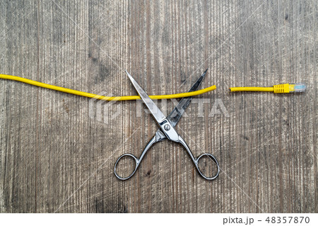 Scissors cut the network cable,top view Scissors cut the network cable,top view 48357870