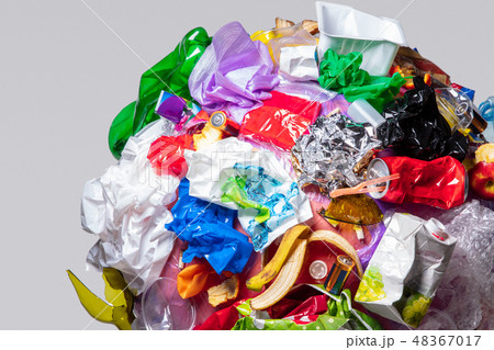 A globe of the earth with trash over white background, the concept of ecology problem 48367017
