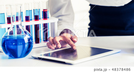 Scientist working in biochemistry laboratory. Scientist working in biochemistry laboratory. 48378486