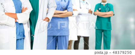 Doctor working in hospital with other doctors. 48379250