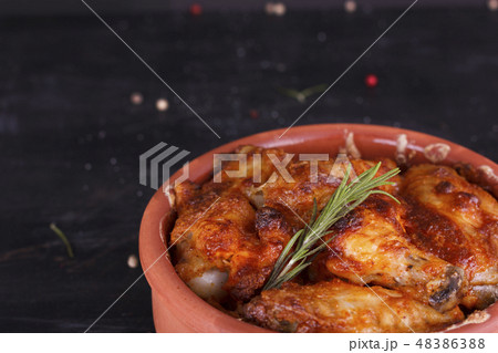 Chicken in paprika sauce baked in the oven  48386388