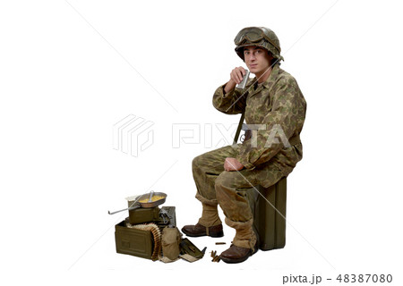 young American soldier drinking young American soldier drinking 48387080
