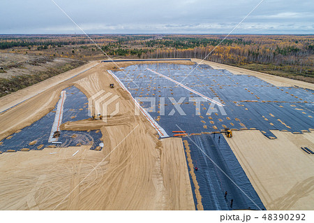 the construction of the landfill and installation of geomembrane the construction of the landfill and installation of geomembrane 48390292