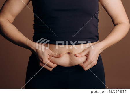 woman fitness fat sagging stomach slimming body woman fitness fat sagging stomach slimming body 48392855