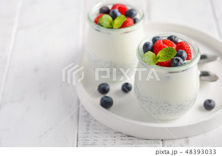 Chia seed pudding with fresh berries. 48393033