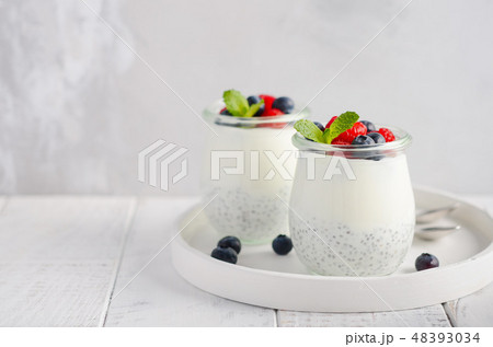 Chia seed pudding with fresh berries. Chia seed pudding with fresh berries. 48393034