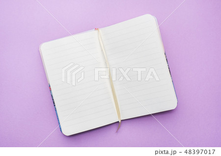 Top view of the opened notebook with blank paper  48397017