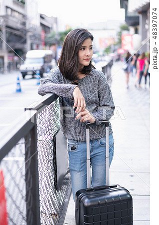 Travel concept. Beautiful girls take a holiday to travel. Beauti Travel concept. Beautiful girls take a holiday to travel. Beauti 48397074