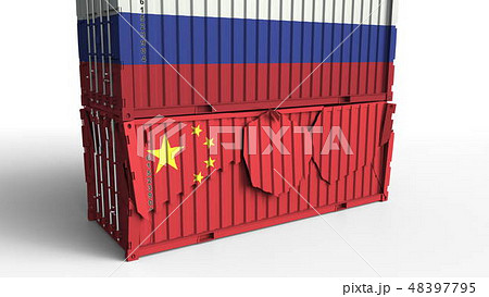 Container with flag of Russia breaks cargo container with flag of China. Trade war or economic 48397795