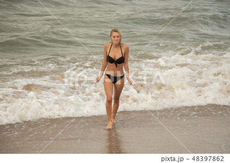 girl on winter sea girl on winter sea 48397862