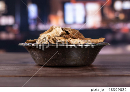 Dry brown mushroom boletus edulis with restaurant 48399022